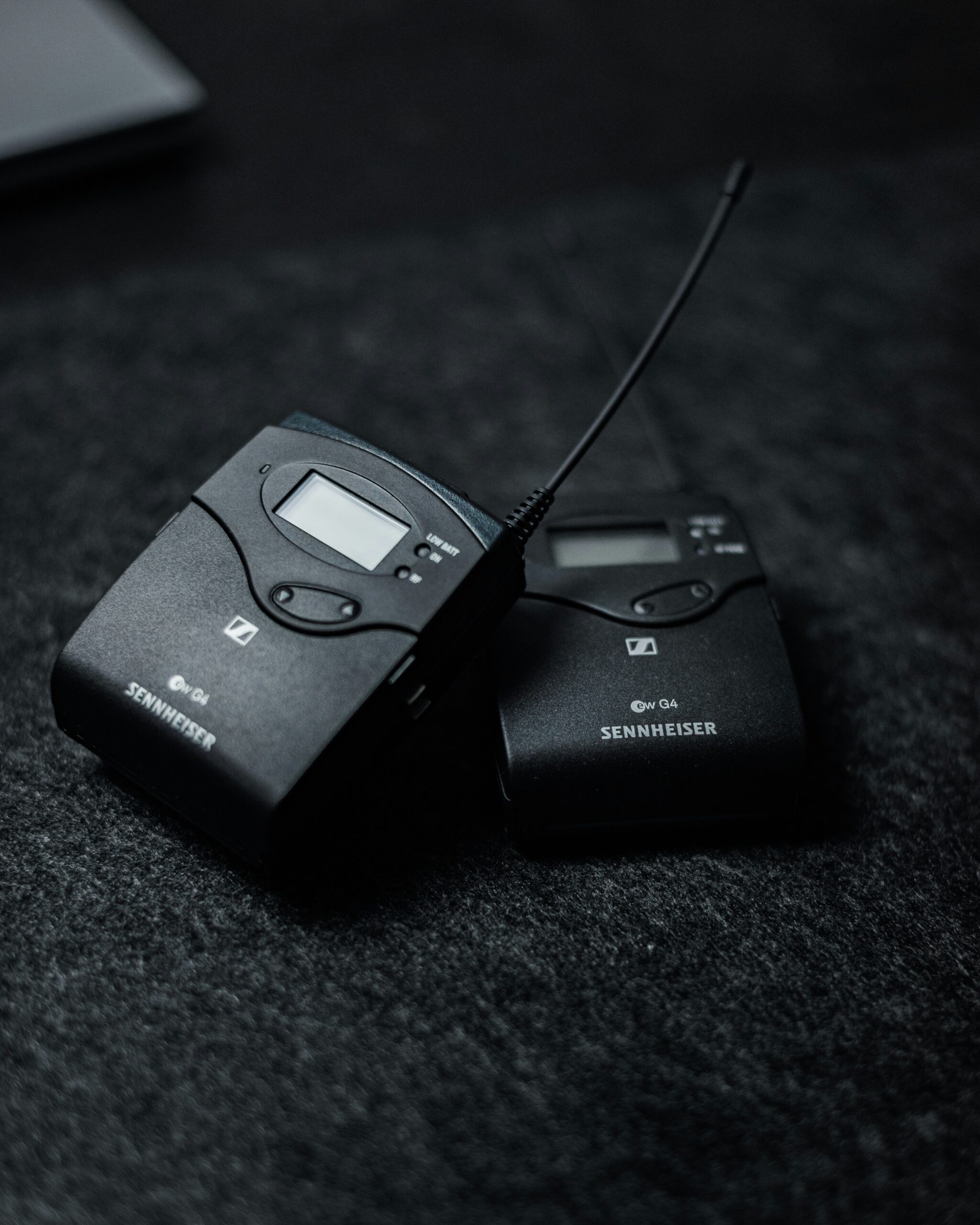 Dancers performing a flash mob with portable AV speakers in a public square